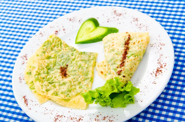 Pancake with herbs in the plate — Stock Photo, Image