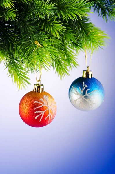 Baubles on christmas tree in celebration concept — Stock Photo, Image