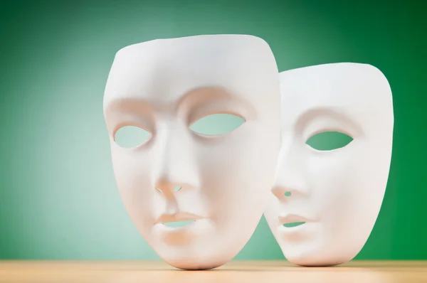 Masks with theatre concept Stock Picture