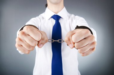 Businessman handcuffed for his crimes clipart