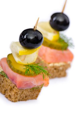 Canape served in the plate clipart