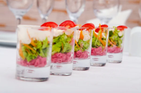 Vegetarian salad served in glasses — Stock Photo, Image