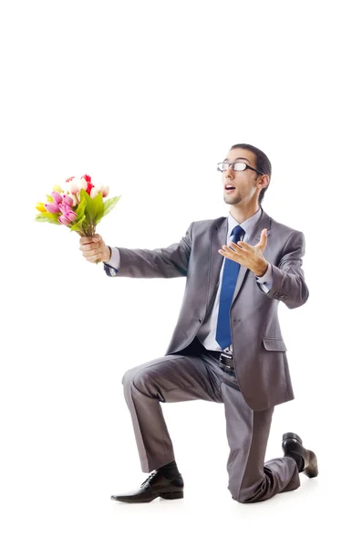 Businessman offering tulip flowers — Stock Photo, Image