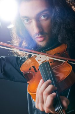 Violin player playing the intstrument clipart