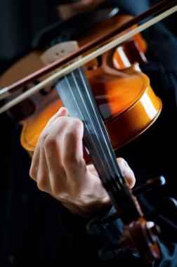 Violin player playing the intstrument clipart