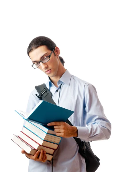 Student z stos książek na biały — Zdjęcie stockowe