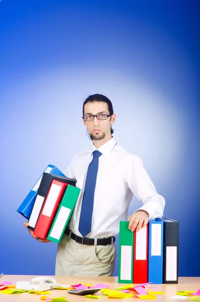 Businessman with many office folders — Stock Photo, Image