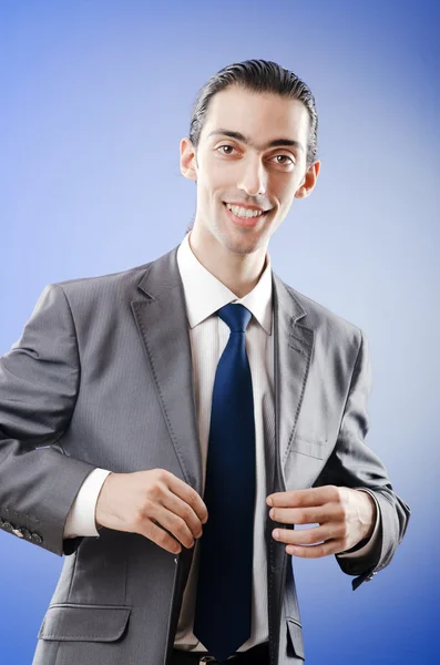 Young businessman in studio shooting — Stock Photo, Image