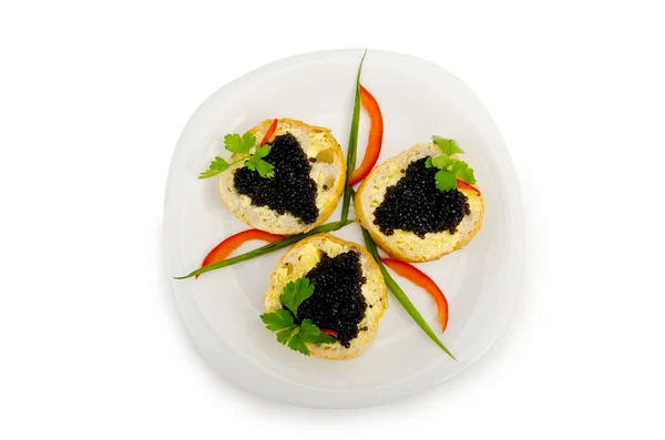 Fekete kaviár a tányérban. — Stock Fotó