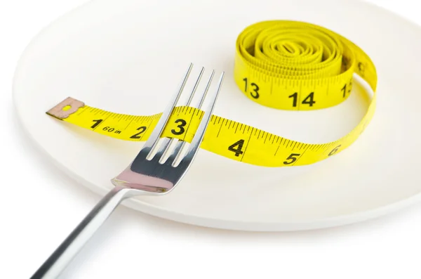 Concepto de dieta con horquilla y medidor — Foto de Stock