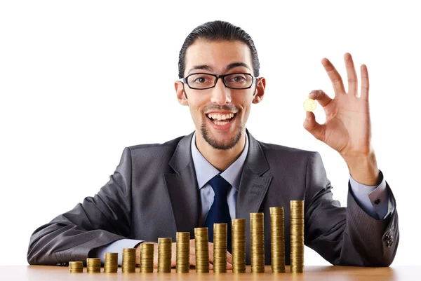 Growth concept with coins and businessman — Stock Photo, Image