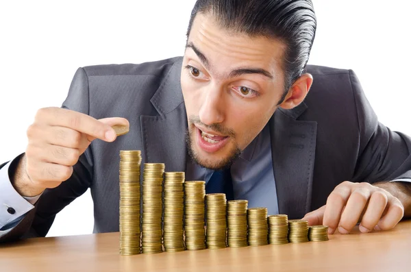 Growth concept with coins and businessman — Stock Photo, Image