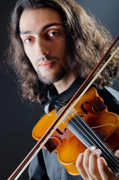 Violin player playing the intstrument — Stock Photo, Image