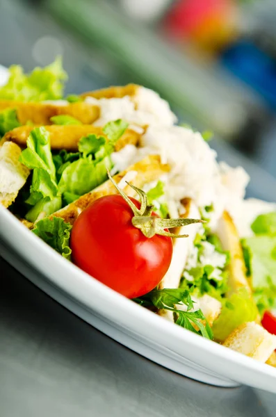 Ceasar salad served in restaurant — Stock Photo, Image