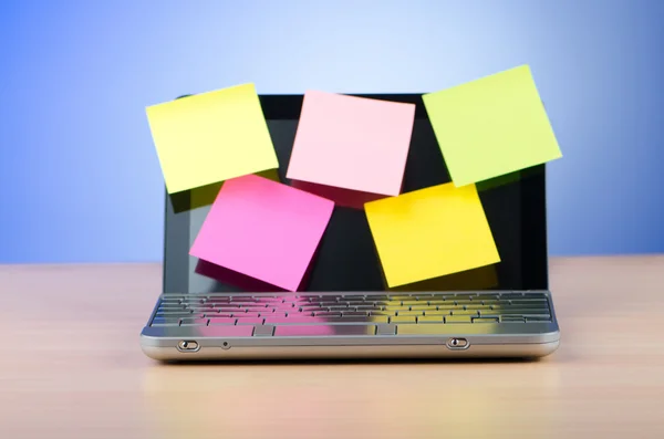 Netbook with reminder notes — Stock Photo, Image