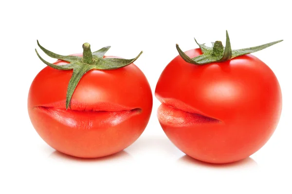 Två tomater med munnar — Stockfoto
