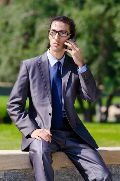 Young businessman at the street scene — Stock Photo, Image