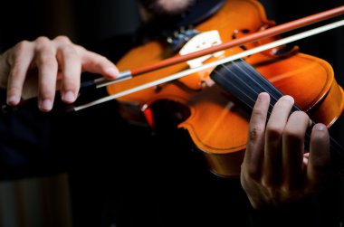 Violin player playing the intstrument clipart