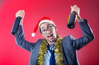 Drunken businessman after office christmas party clipart