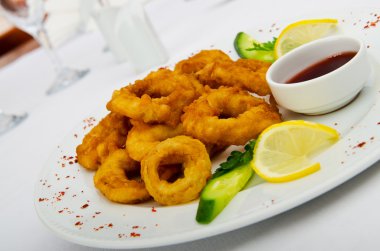 Calamari rings in the plate clipart