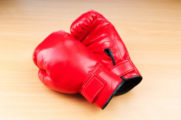 Boxing gloves on the table — Stock Photo, Image