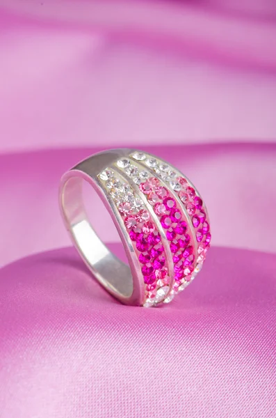 Jewellery ring on the satin background — Stock Photo, Image