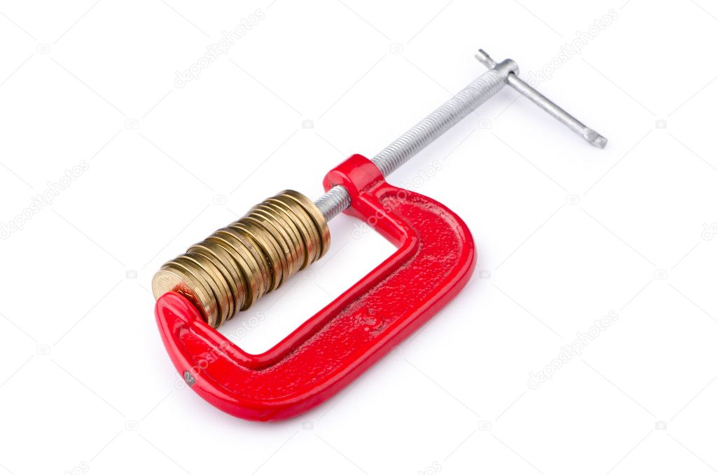 Business concept with clamp and coins isolated