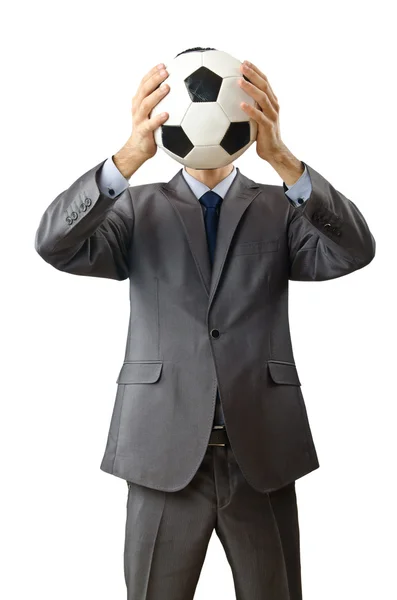 Uomo d'affari che tiene il calcio su bianco — Foto Stock