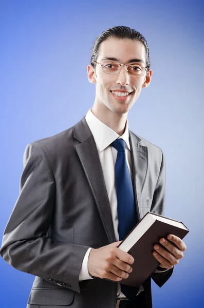 Businessman reading the book — Stock Photo, Image