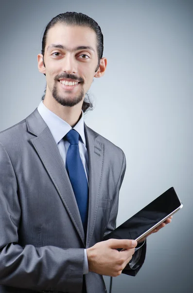 Businessman working on tablet computer — Stock Photo, Image