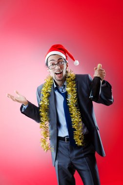 Drunken businessman after office christmas party clipart