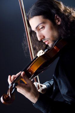 Young violin player playing clipart