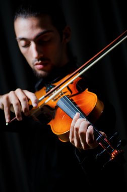 Violin player playing the intstrument clipart