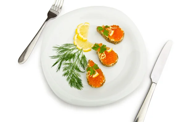 Caviar rojo servido sobre pan —  Fotos de Stock