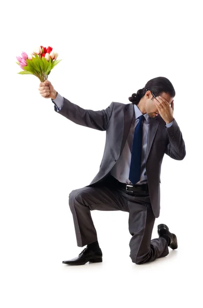 Zakenman aanbieden tulp bloemen — Stockfoto