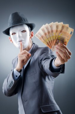 Businessman with money and mask clipart