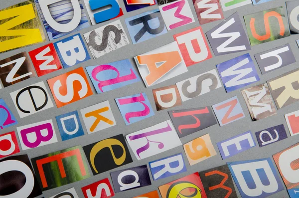 Cut letters from newspapers and magazines — Stock Photo, Image