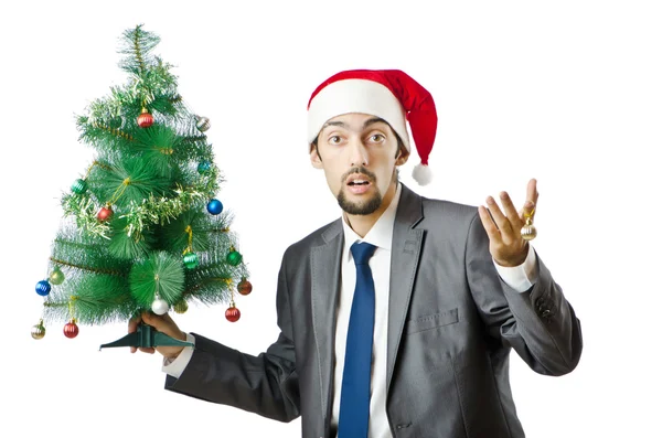 ホワイト上にクリスマス ツリーを持ったビジネスマン — ストック写真