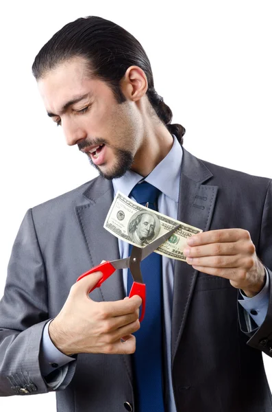 Homme coupant de l'argent sur blanc — Photo