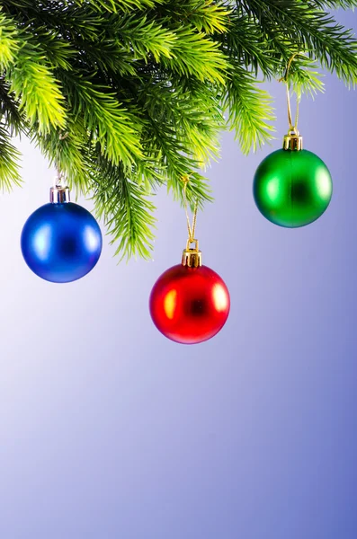 stock image Baubles on christmas tree in celebration concept