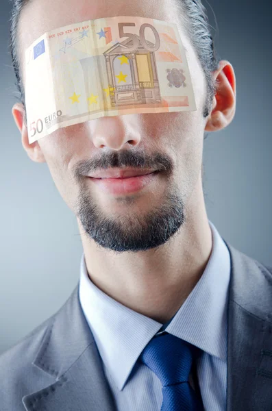 Businessman blinded with money — Stok fotoğraf