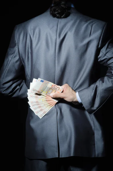 Man met counterfeir geld — Stockfoto