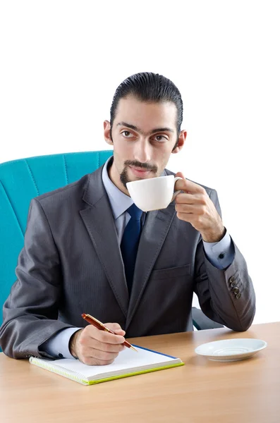 Бізнесмен сидить за столом — стокове фото