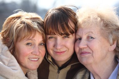 Portrait of women of three generations of one family clipart