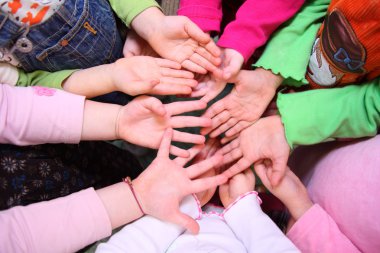 Children's palms, top view clipart