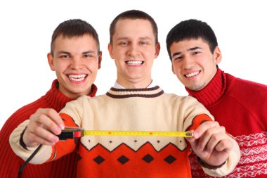 Three young men with tape measure clipart