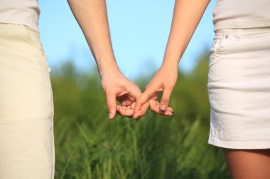 Man's and female's hands to be held for each other clipart