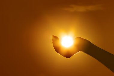 Sun on hand gesture clipart