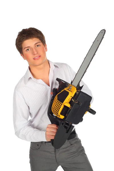 Young man with chainsaw — Stock Photo, Image