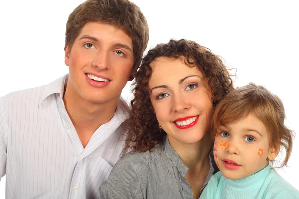 Family of three with drawings on child face — Stock Photo, Image